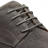 Close up image of dark grey suede on Original Carbon